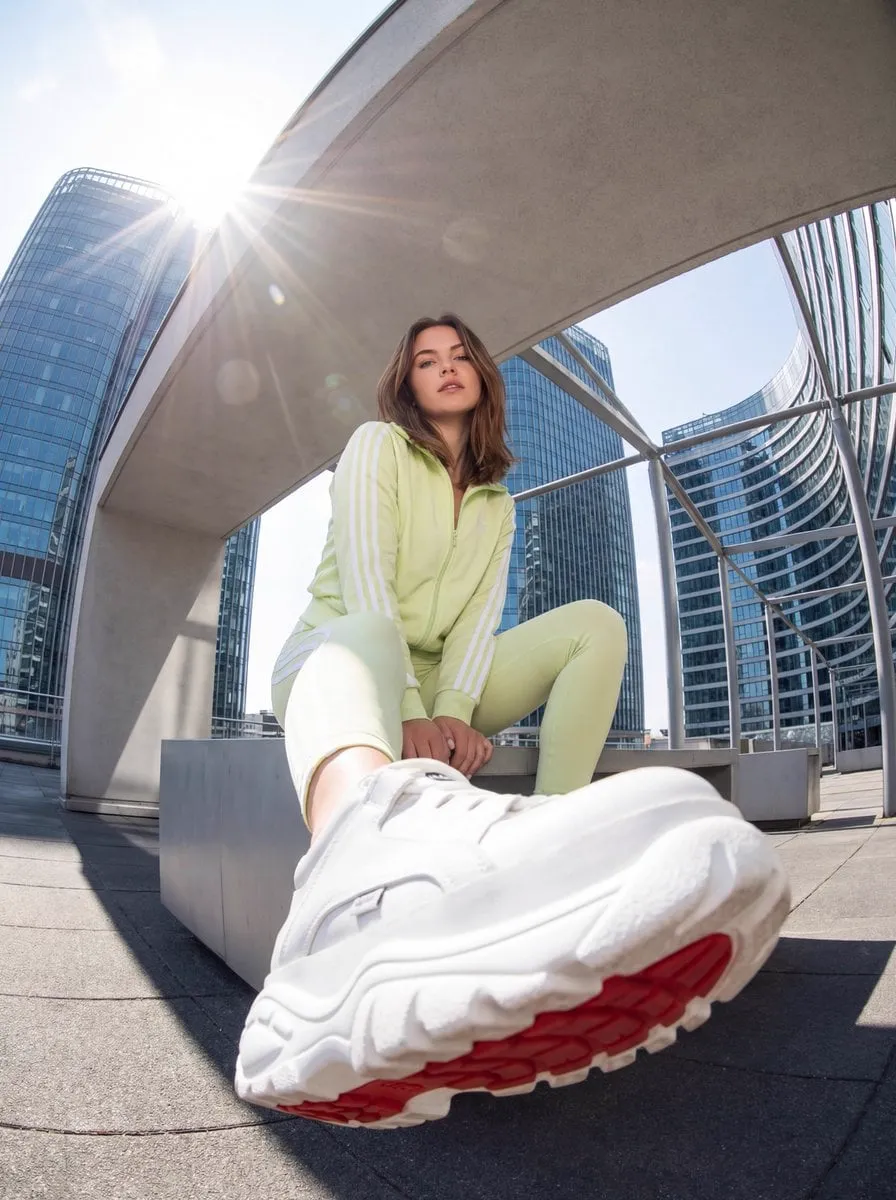 "scene_description": { "location": "Urban rooftop or high vantage point with a… — 1/3