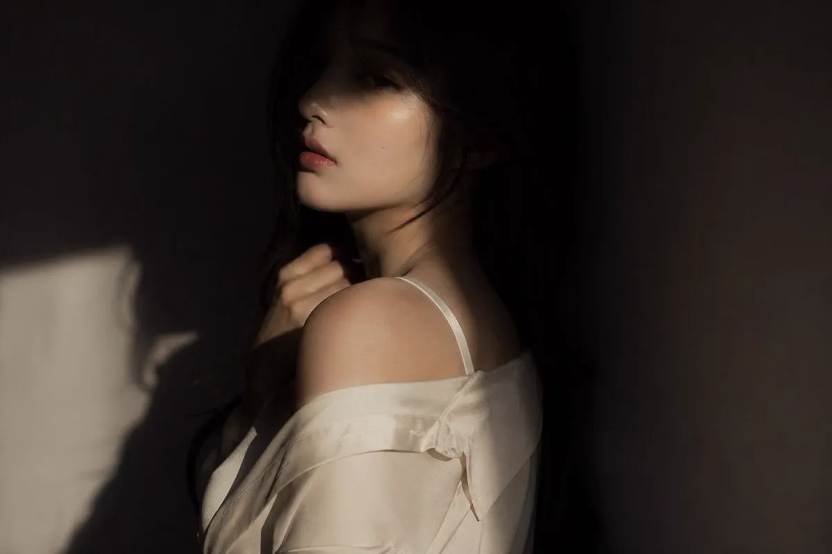 editorial portrait, Korean female idol, subtly sensual outfit: silk shirt or…