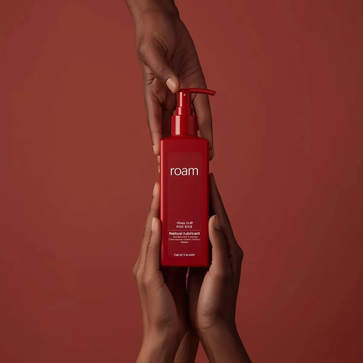 Minimalist product photography of a matte red pump bottle labeled ‘ROAM… — 2/2