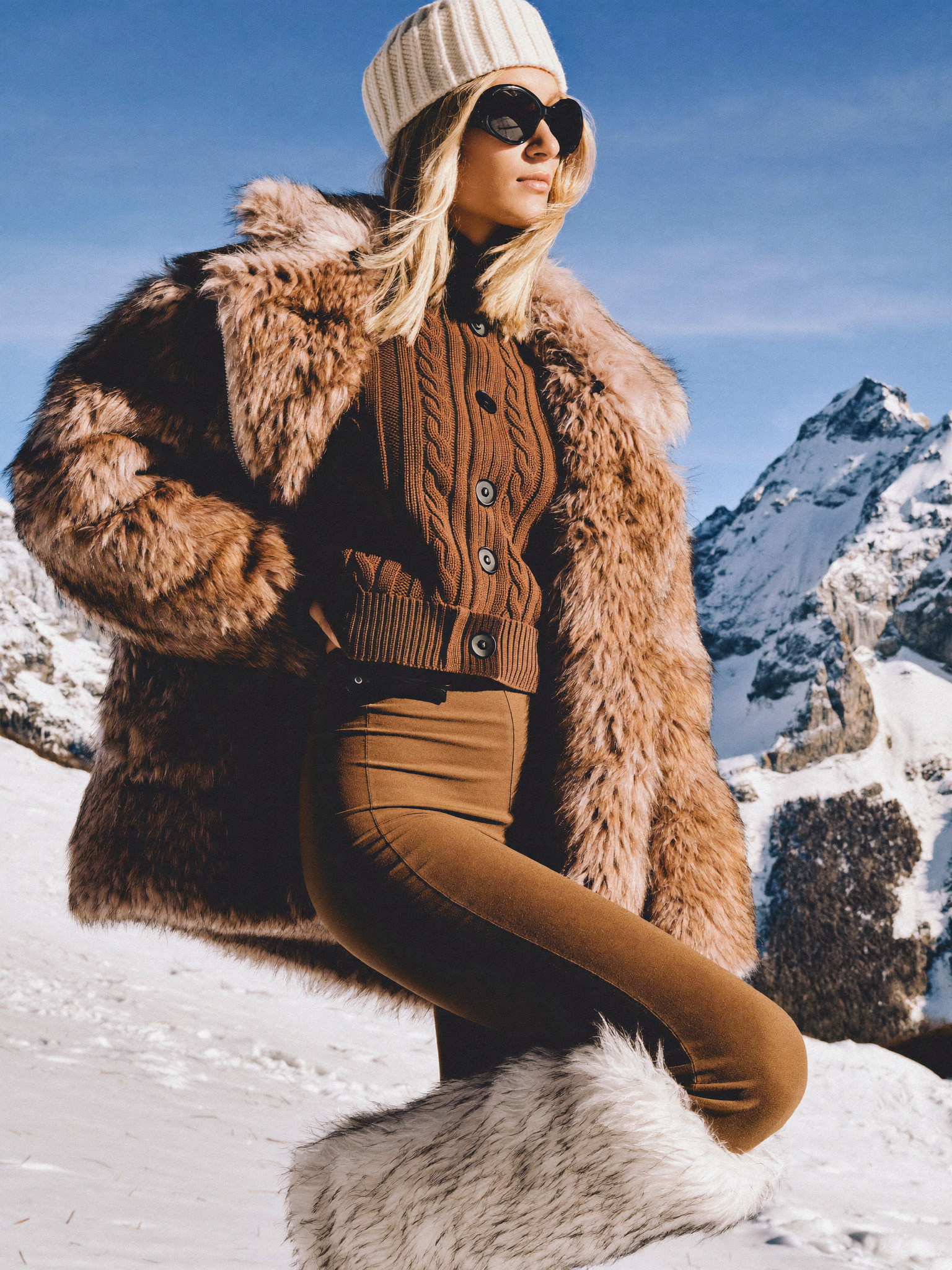 A low-angle medium shot captures a young adult Caucasian woman standing in a snowy...
